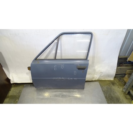 DRZWI LEWY PRZÓD SKODA 105 L 1.1  